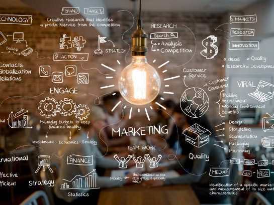 Marketing automation concept with lightbulb and strategy icons representing Echeva’s AI-powered guest engagement services.